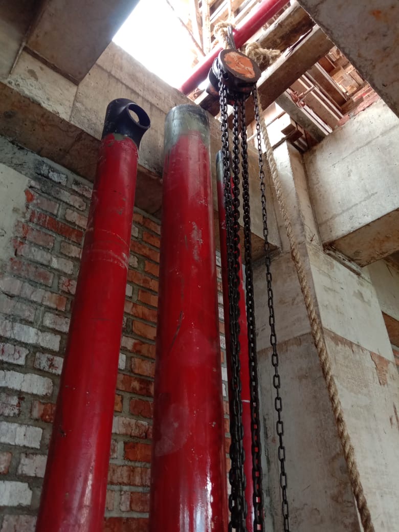 Fire protection riser and piping installed inside a building